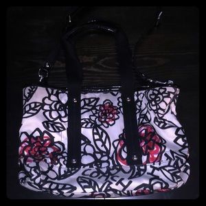 Coach purse. Black, white, and pink